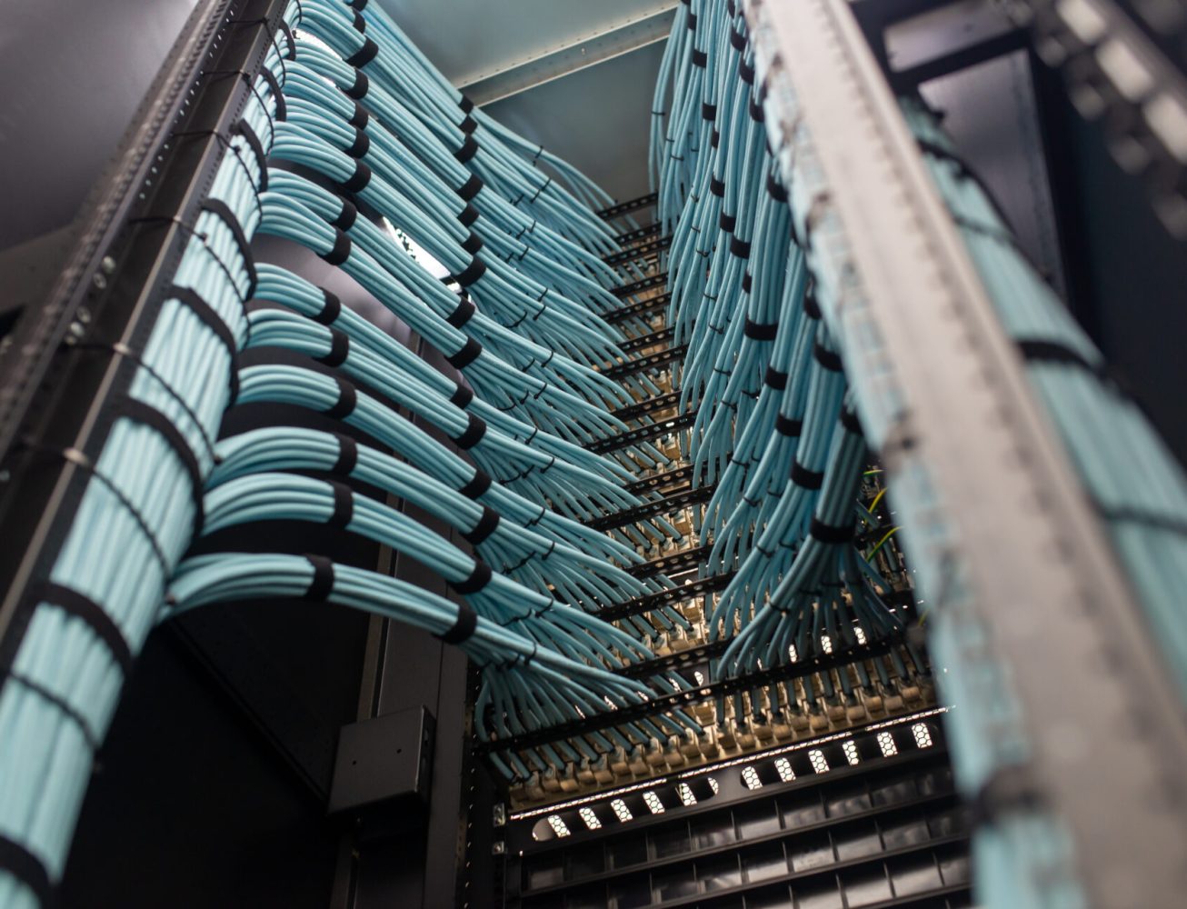 Modern data centre with cable management and blue wires